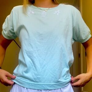 Vintage Colter Bay light blue sea shell top size small
Shoulder pads